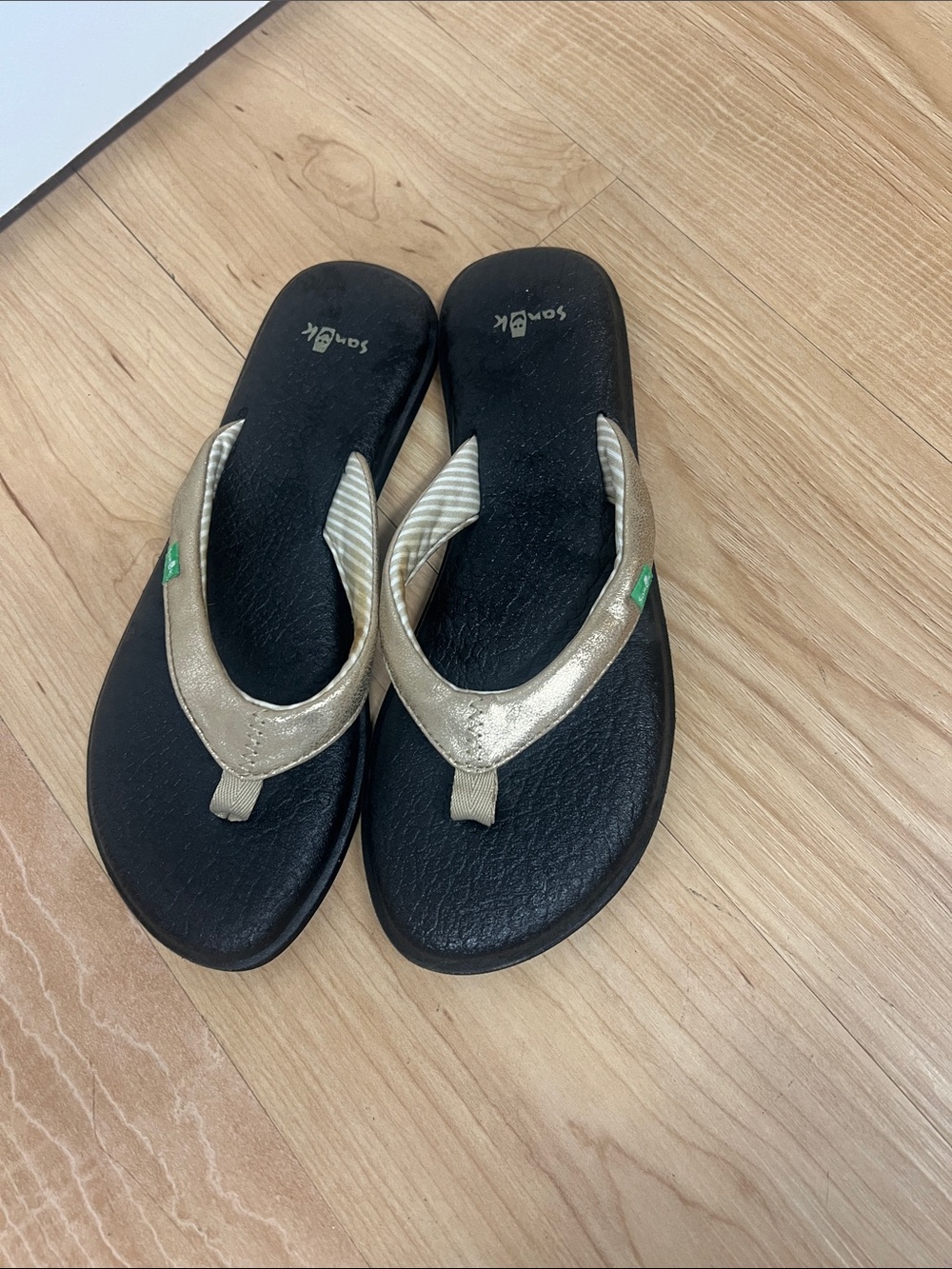 Sanuk Women’s Black Flip Flop Sandals with Gold Straps